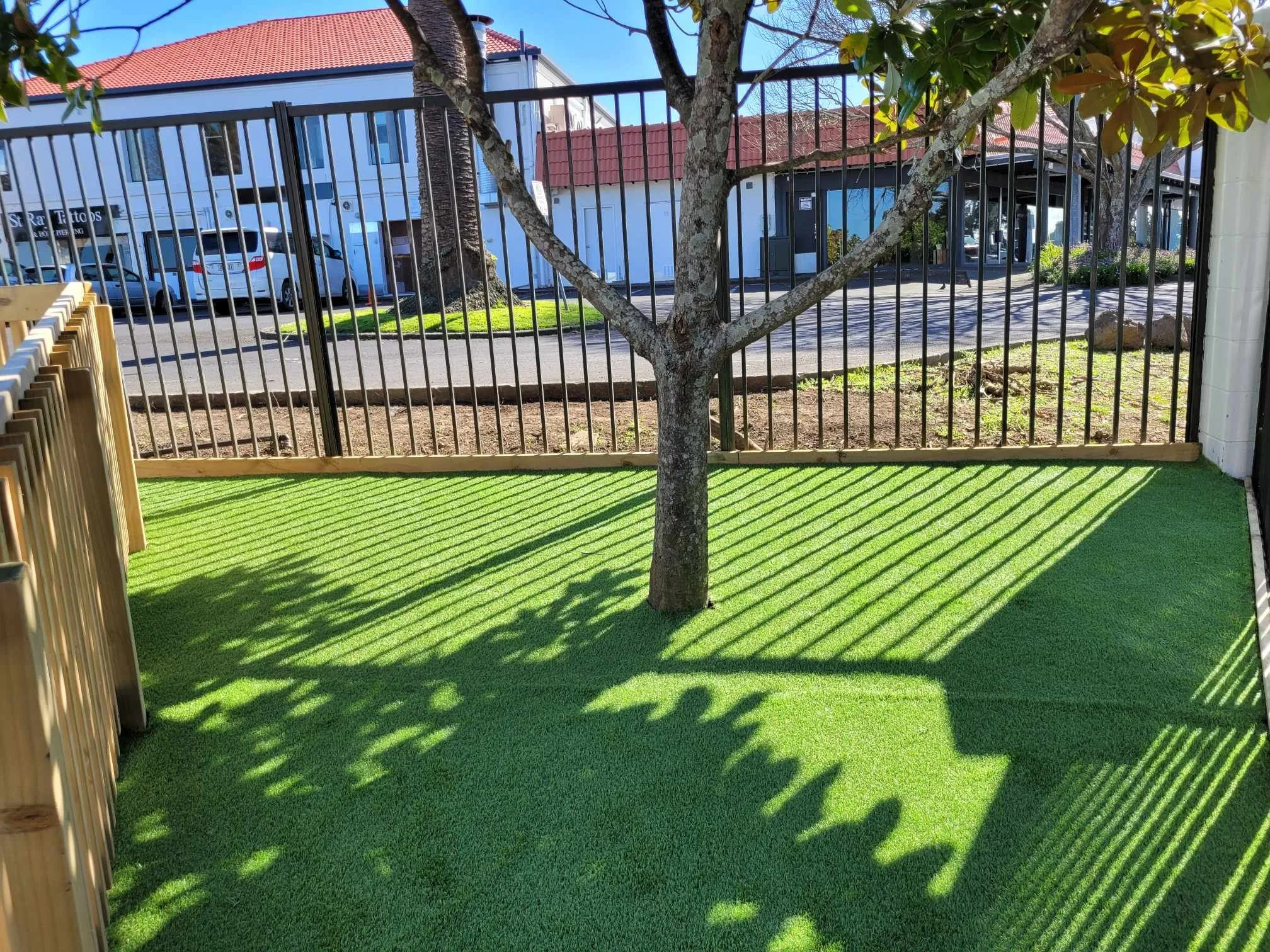 Artificial turf installation around tree