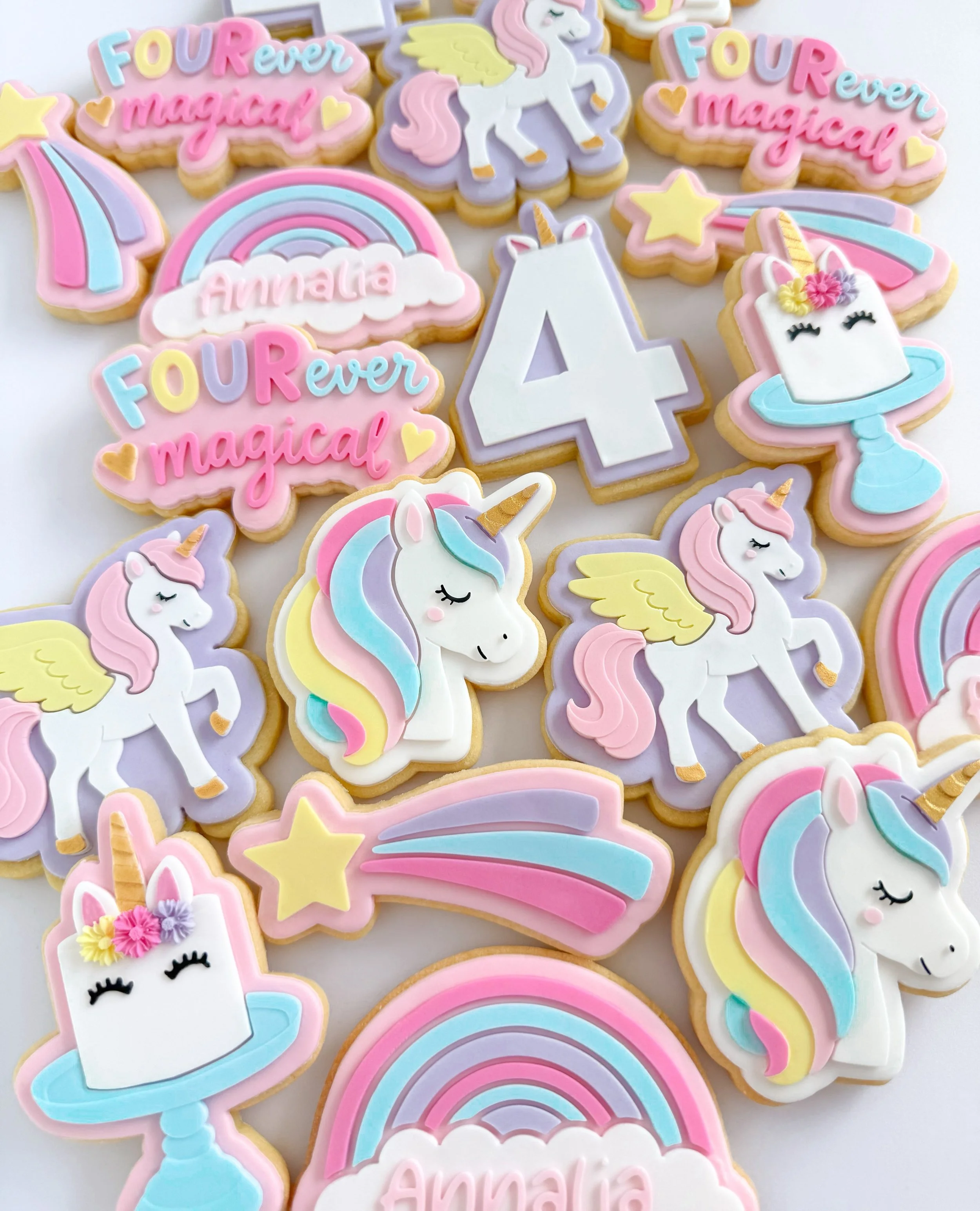 FOURever magical 🦄 Happy 4th birthday Annalia!

And once again a big thank you to her mum Themi who&rsquo;s been a regular customer of mine for a few years now, and always trusts me with free creative reign (my fav) on her cookie sets 🥰 I absolutel