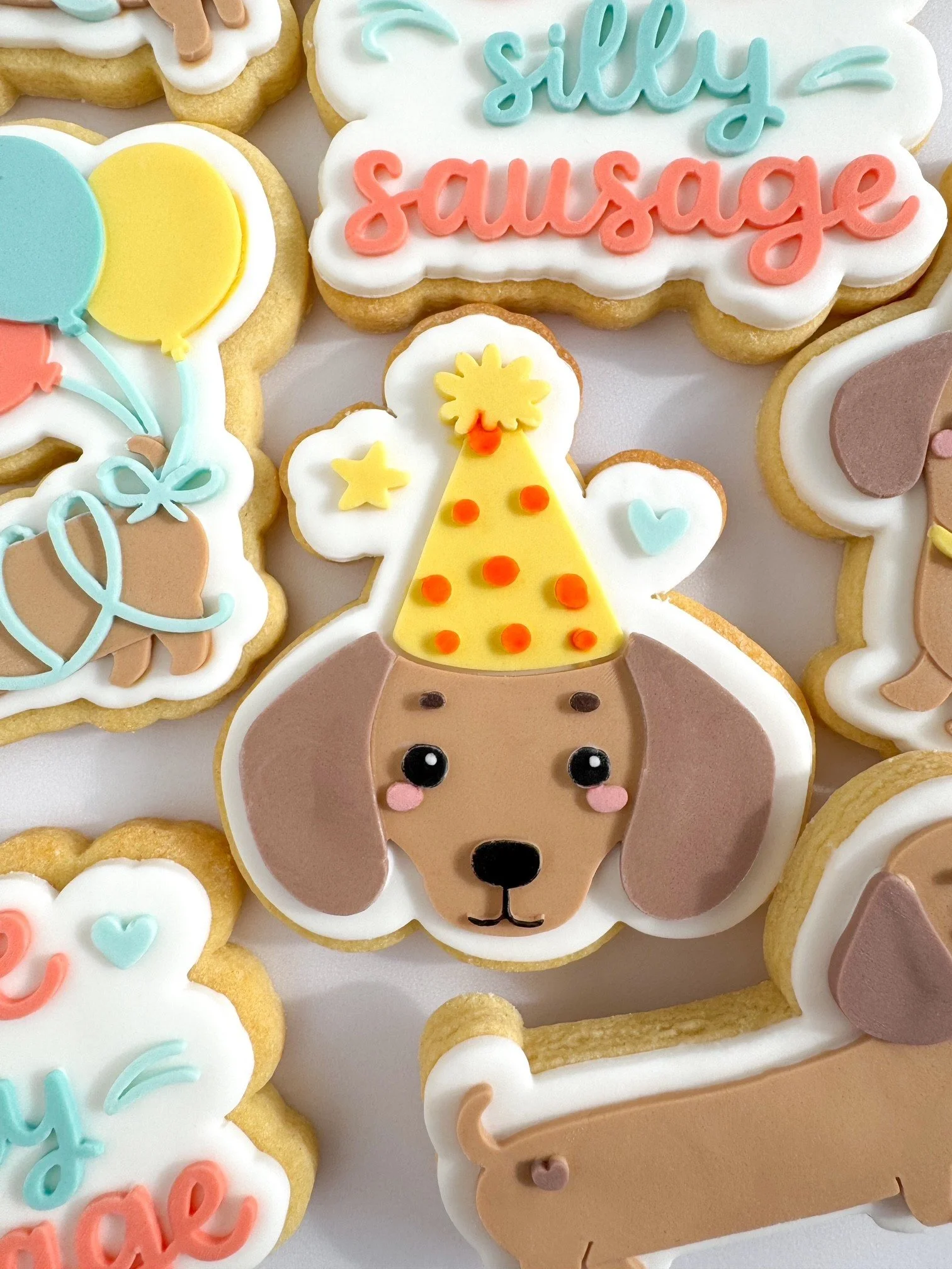 Dachshund Sausage Dog with Party Hat Star Heart.jpg