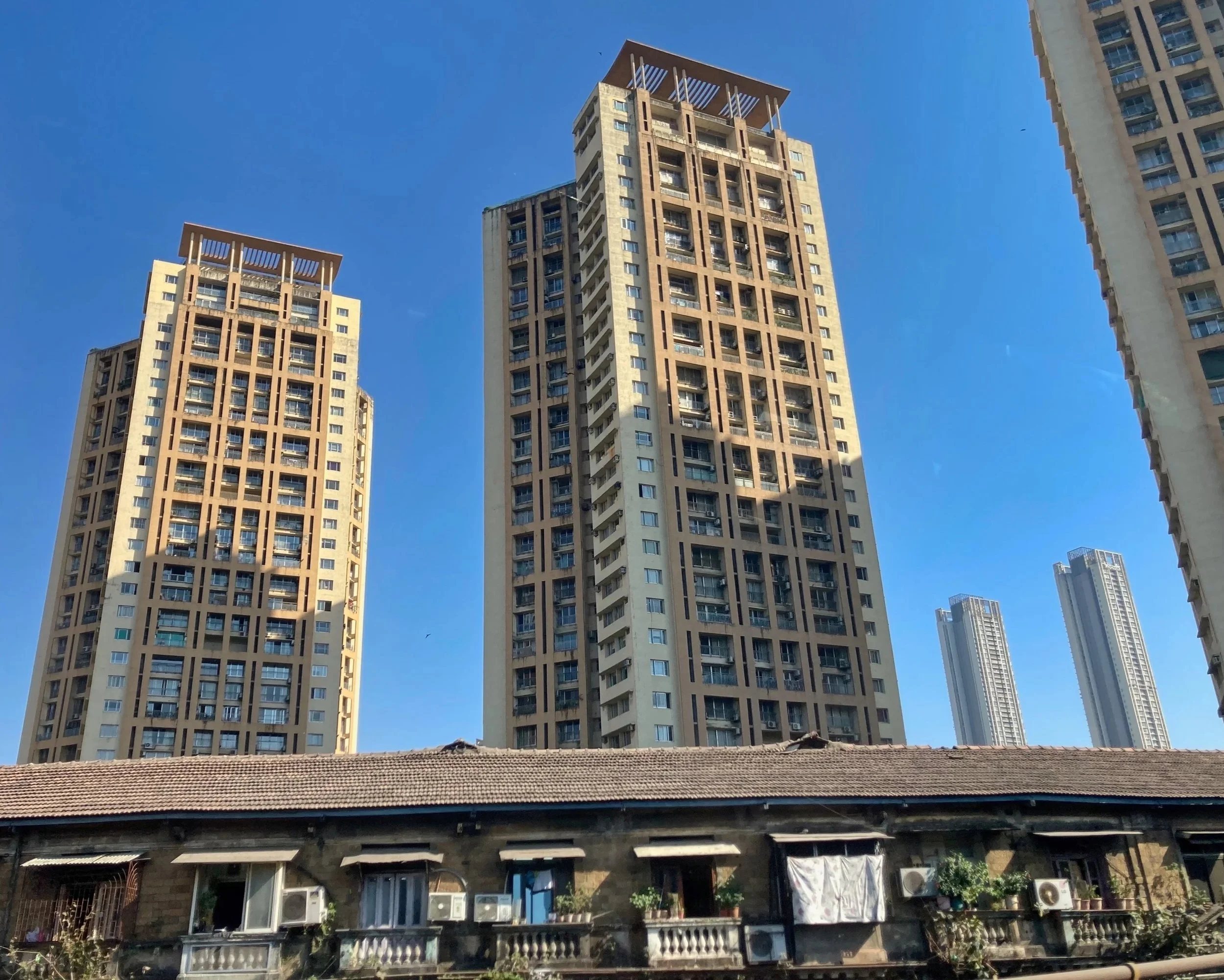 Old buildings meet new high rise apartment blocks.