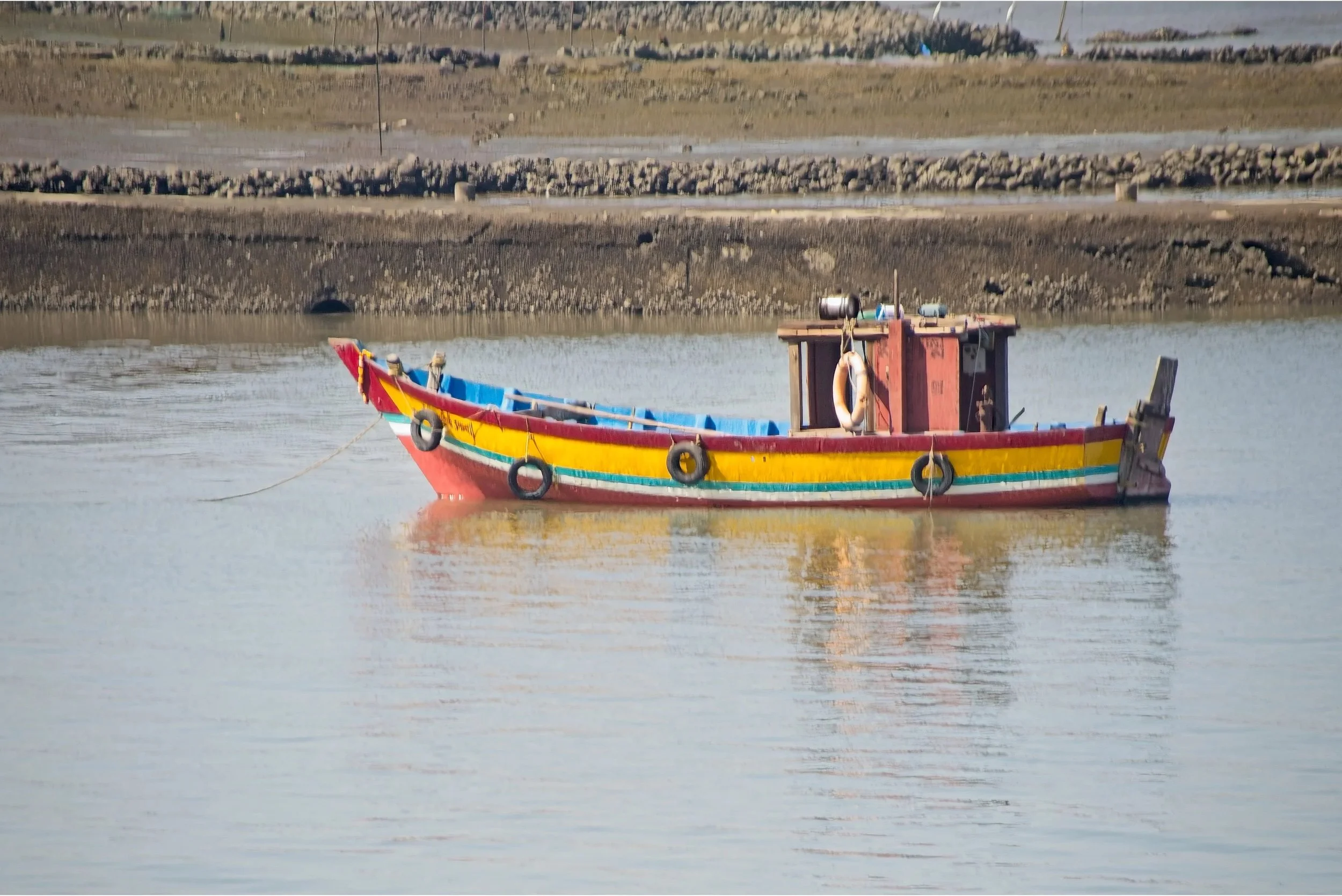 Small fishing boat in the bay