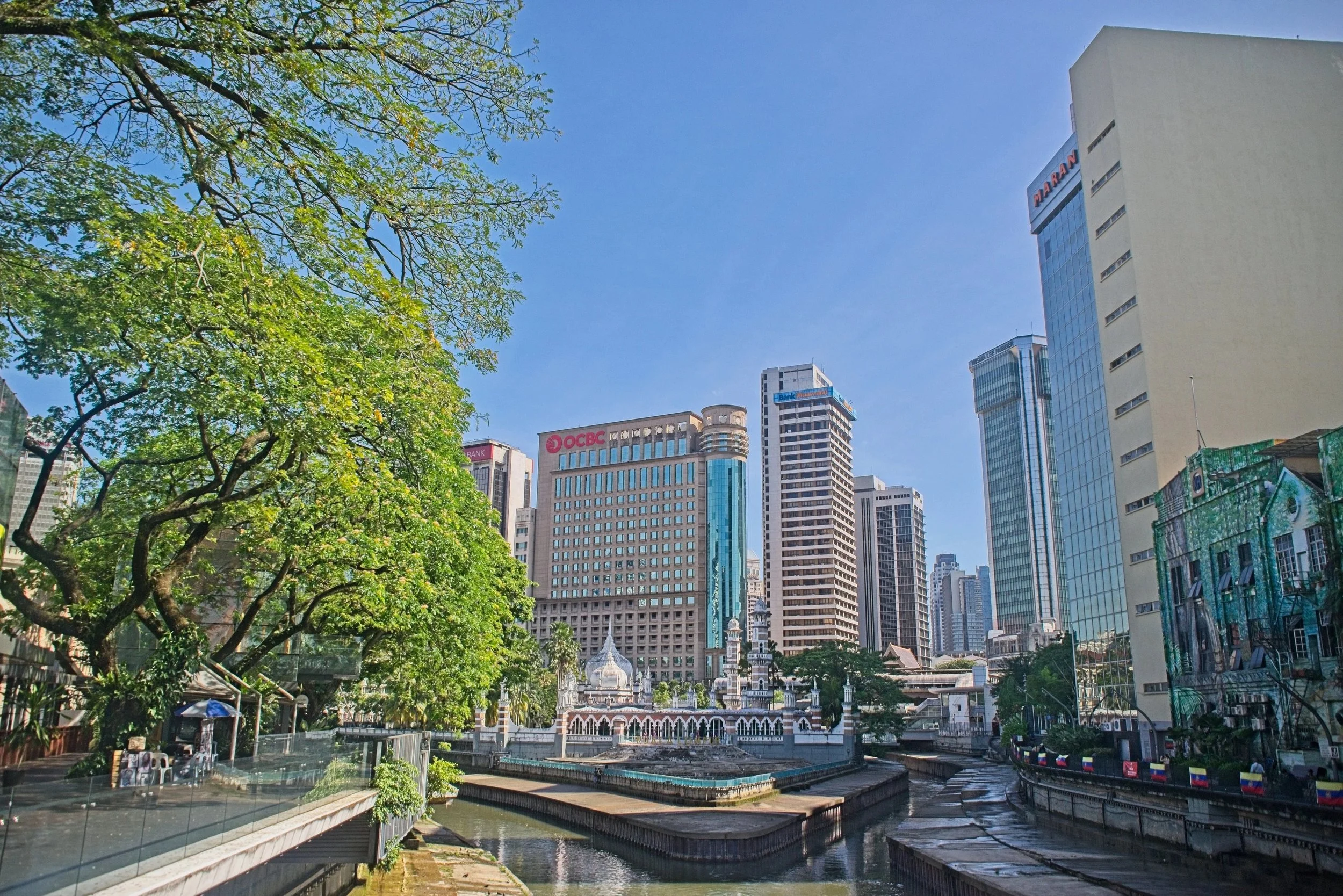 The confluence of the Klang and Gombak Rivers and is said to be the original centre of the city. In the background is the Sultan Samad James Mosque.