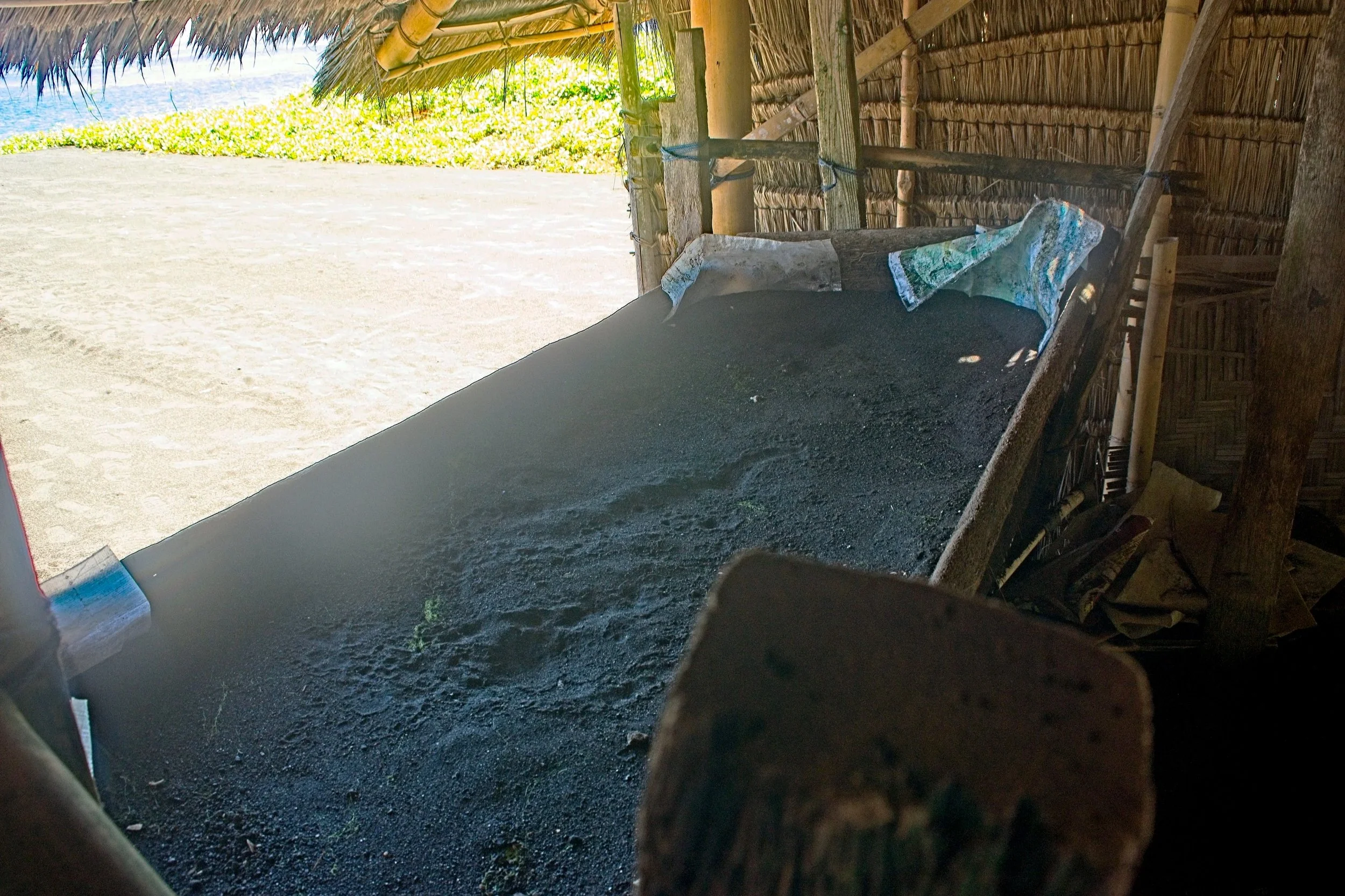 The mound of black volcanic salty sand