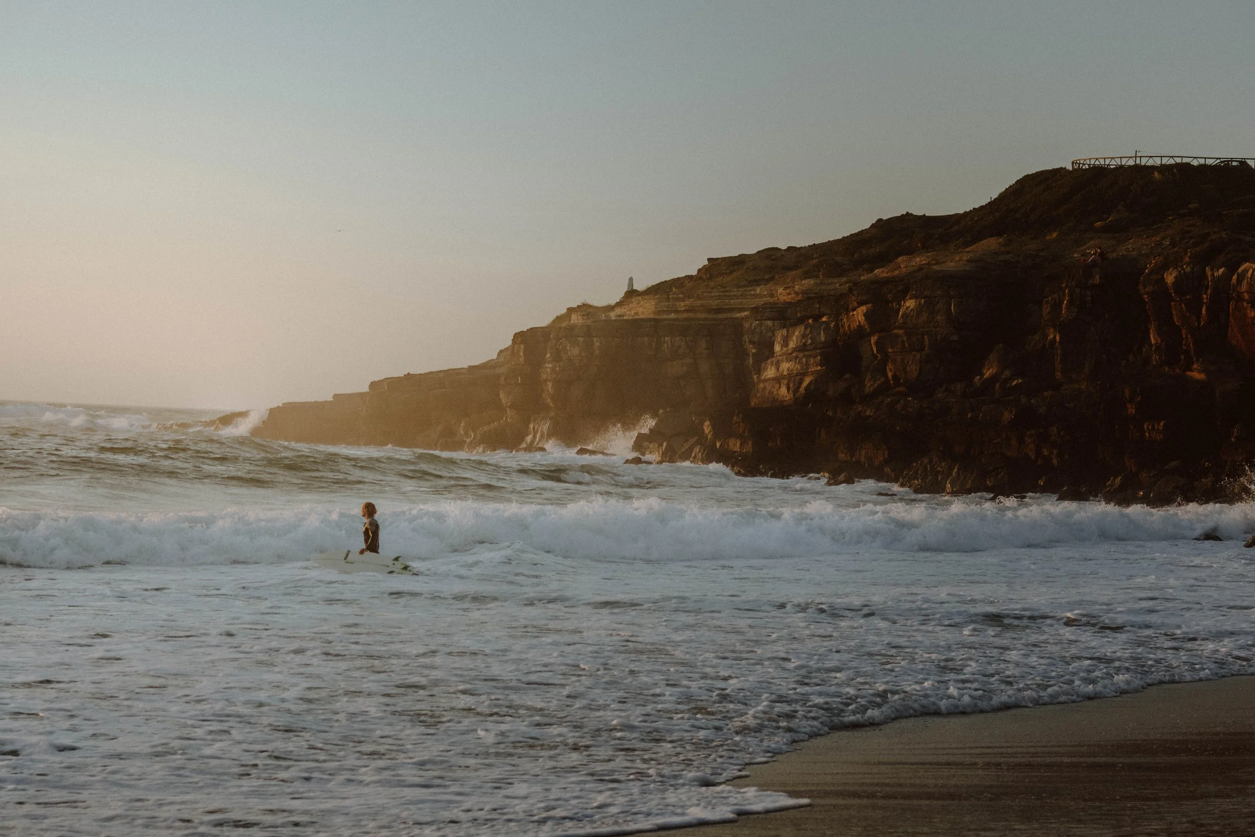 Surfer catching a wave in the ocean