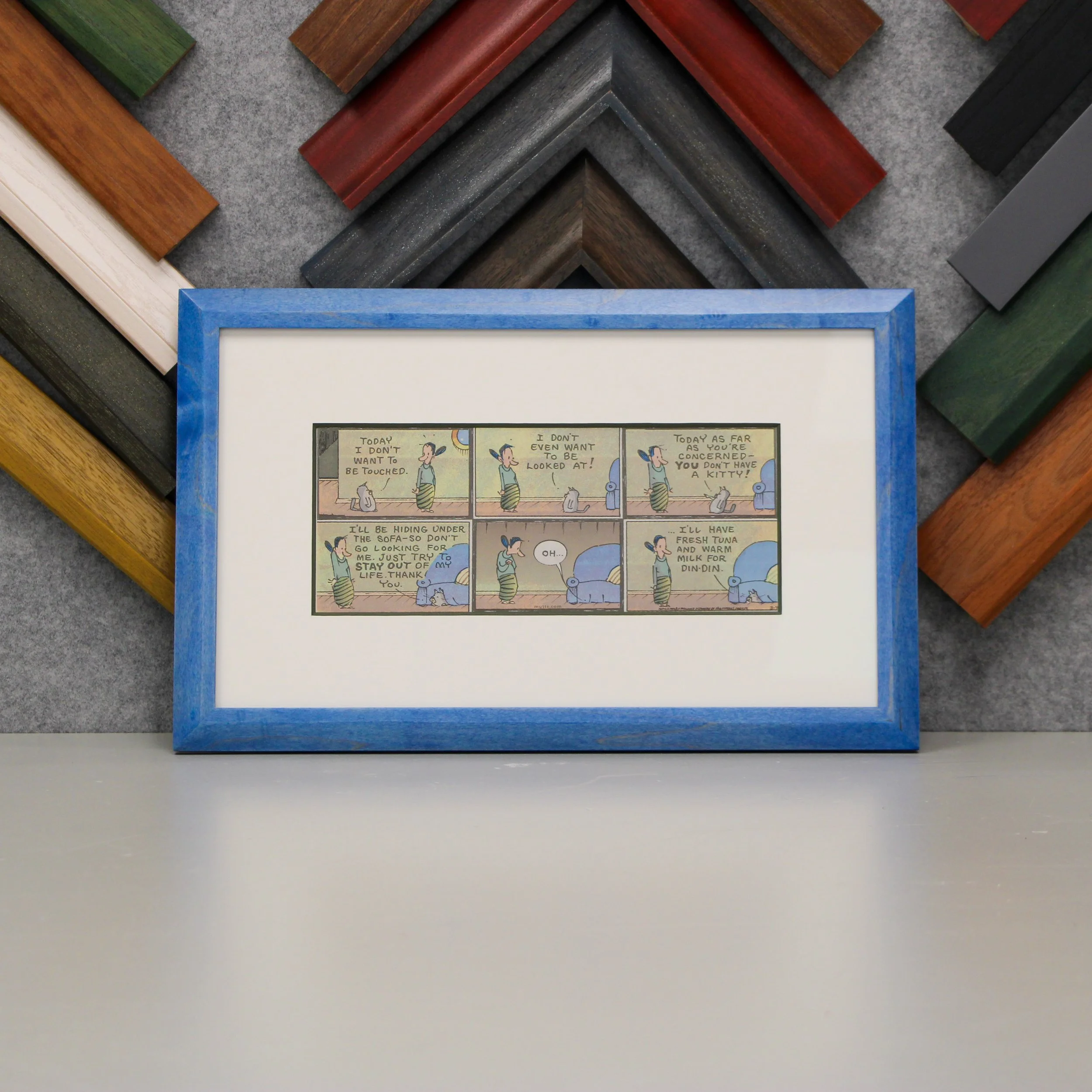A comic page framed in a blue frame.