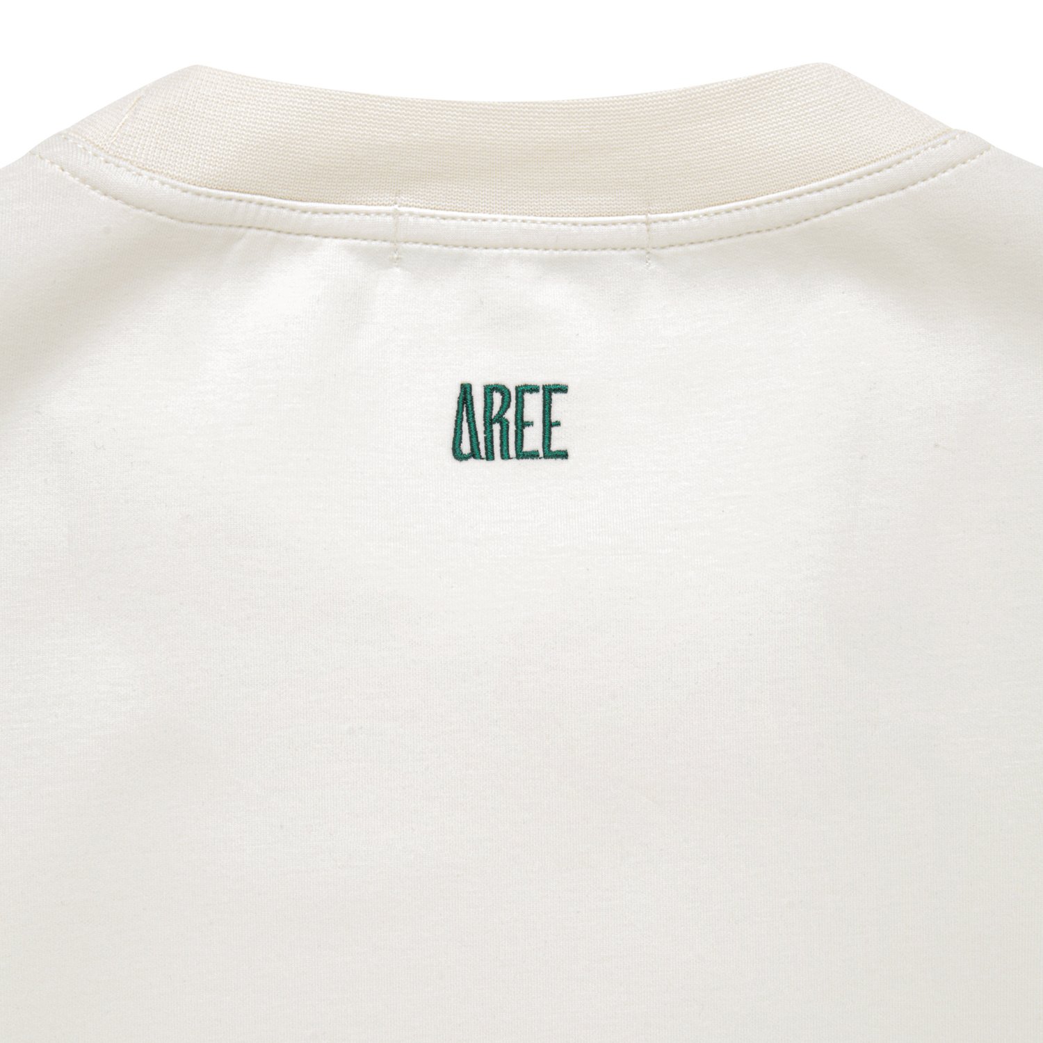 Finished professionally retouched flat-lay close-up photograph of cream sweatshirt.jpg