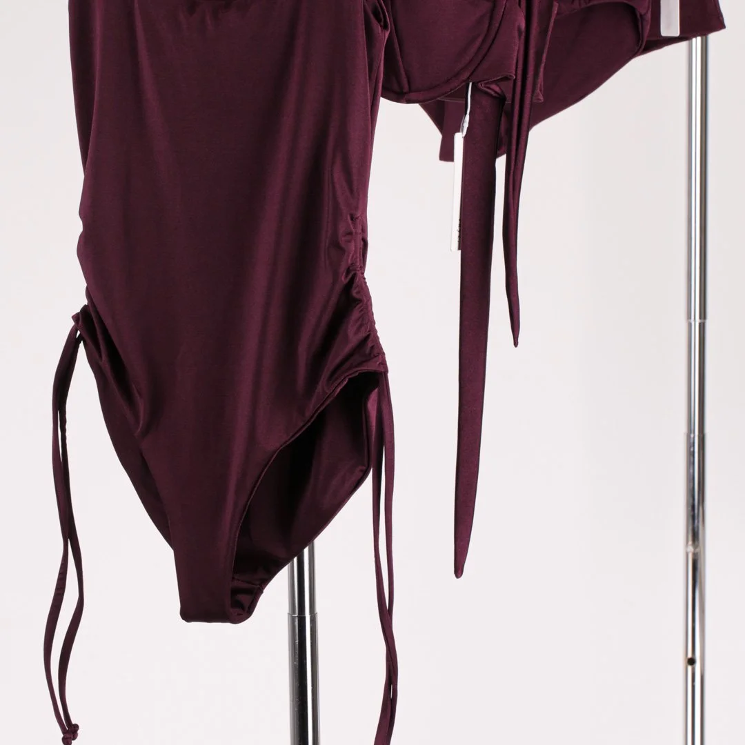 Swimwear collection prepared and arranged on the studio rack