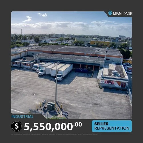Aerial view of an industrial warehouse with several trucks parked outside in Miami Dade. The property is listed for sale at $5,550,000, with seller representation. The image includes a large parking lot and surrounding area.