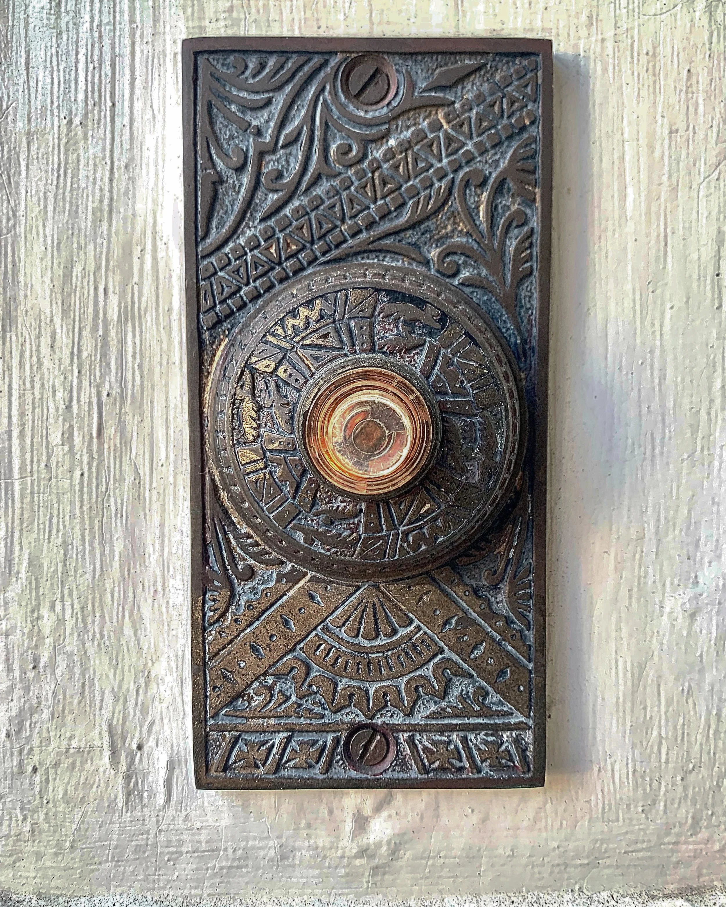 1890s full send. 

Hardware that was all the rage in Gilded-age Charleston and if you look close on our city streets, still very much alive beneath porticos, between door jambs or under decades of paint. 

This complete set, though - the doorbell, do