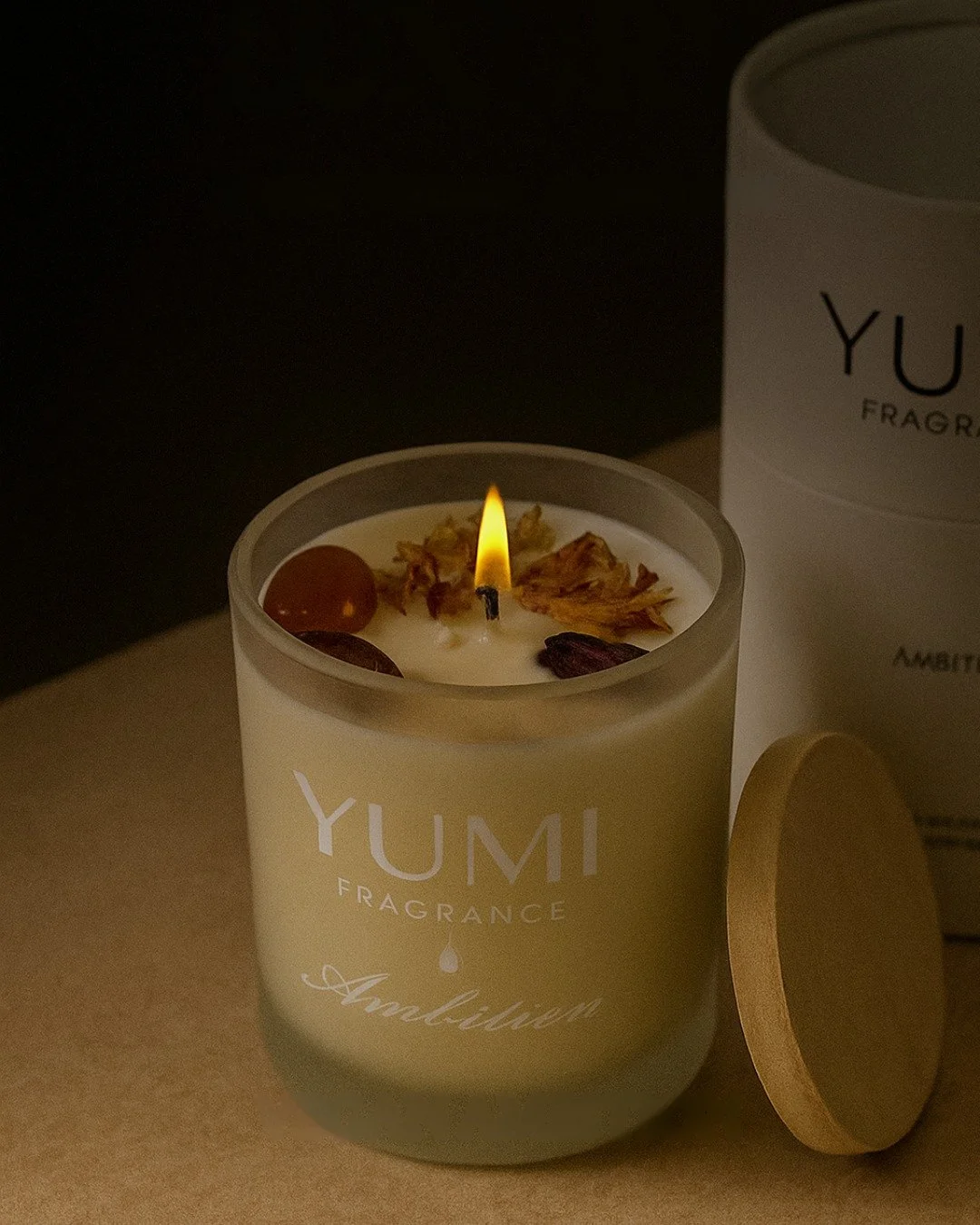 As the golden hues of autumn settle in, we invite you to amplify your sanctuary. Meet our YUMI Ambition Candle&mdash;a fragrance of sugared pear warmed with notes of amber, enhanced by striking crystals that reflect your inner fire.

Create moments o