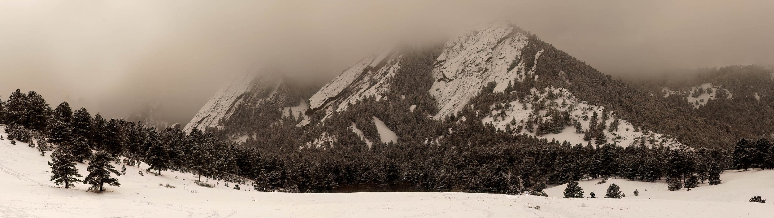 Boulder Flatirons snow and fog.jpg