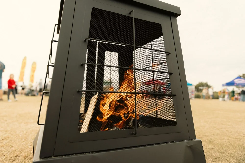 A crackling fire pit warms up the Holiday Market