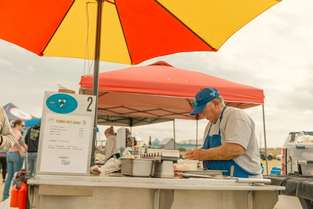 Hot dogs on the grill at the Holiday Market