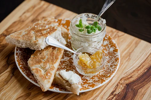 Honey whipped ricotta and bread at Ella’s