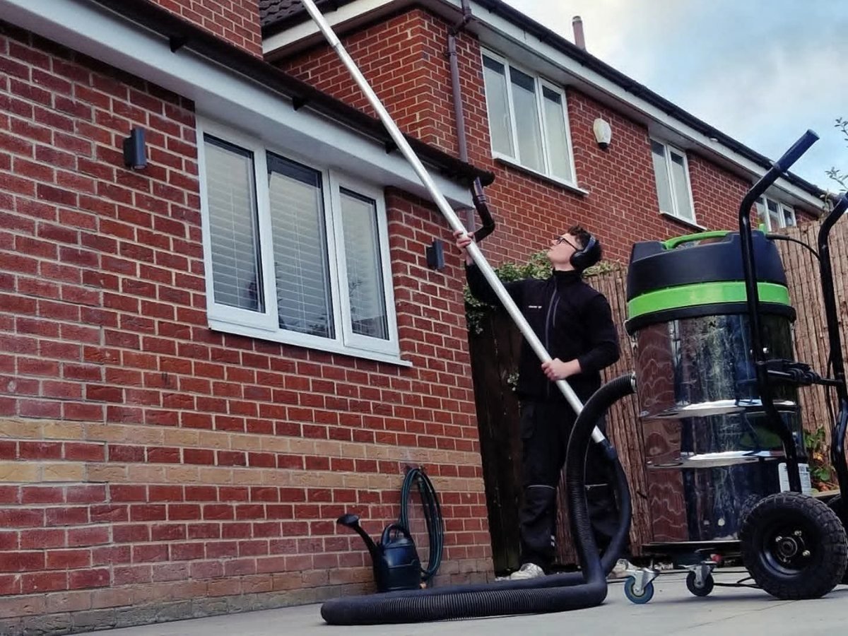 Professional ladder access and hand-clearing for difficult-to-reach guttering