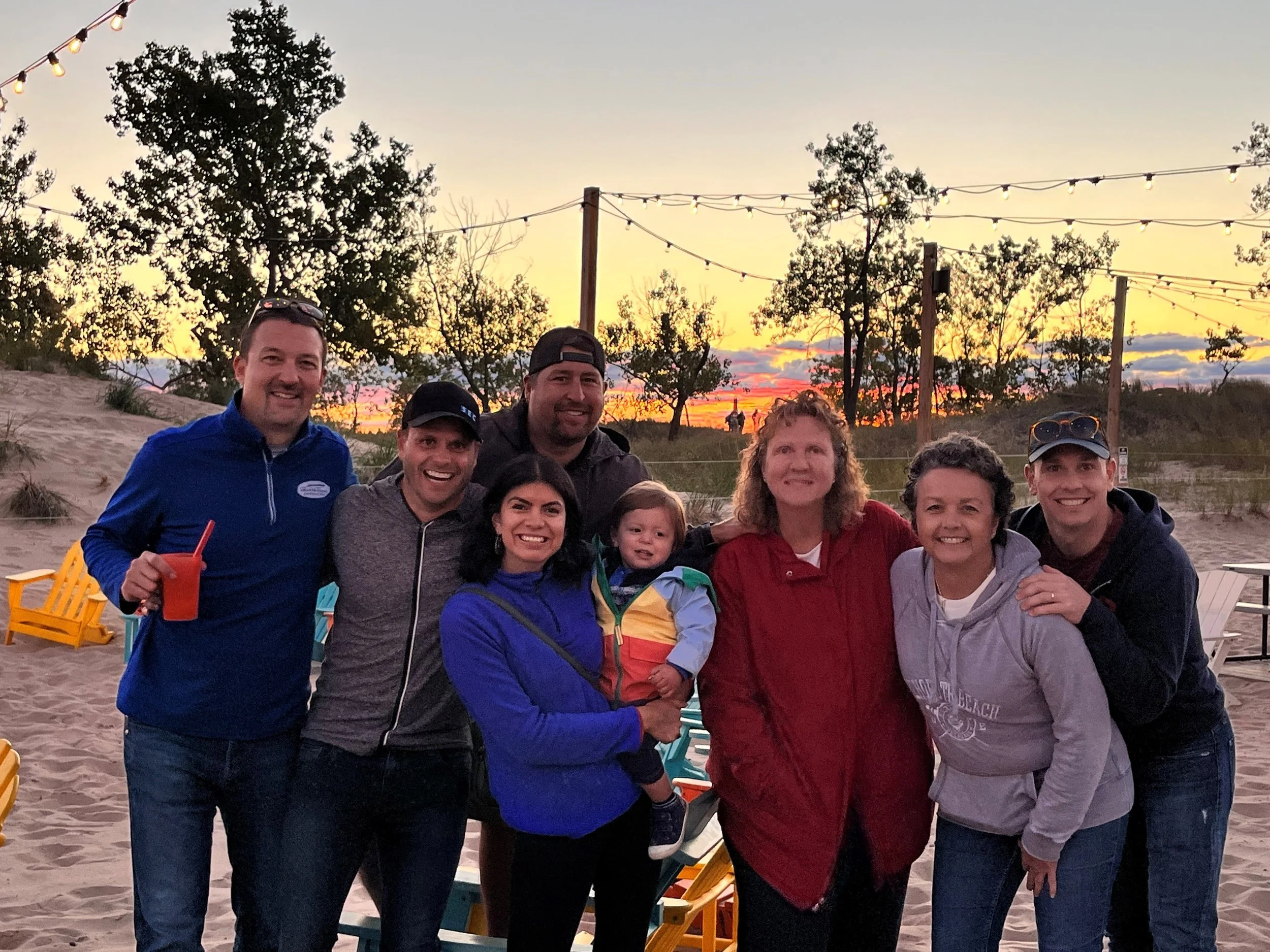 The SecurAlarm team enjoying a night on the beach together