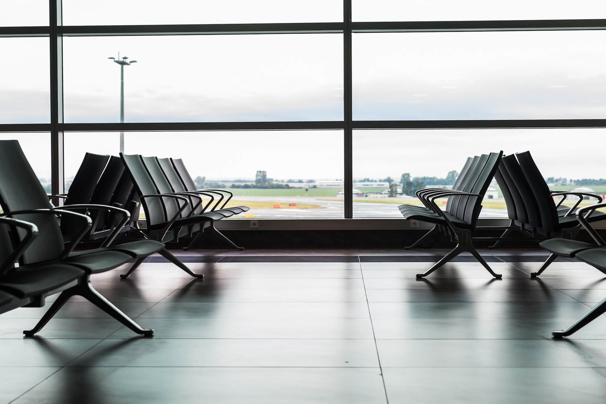Empty seats in the airport terminal.