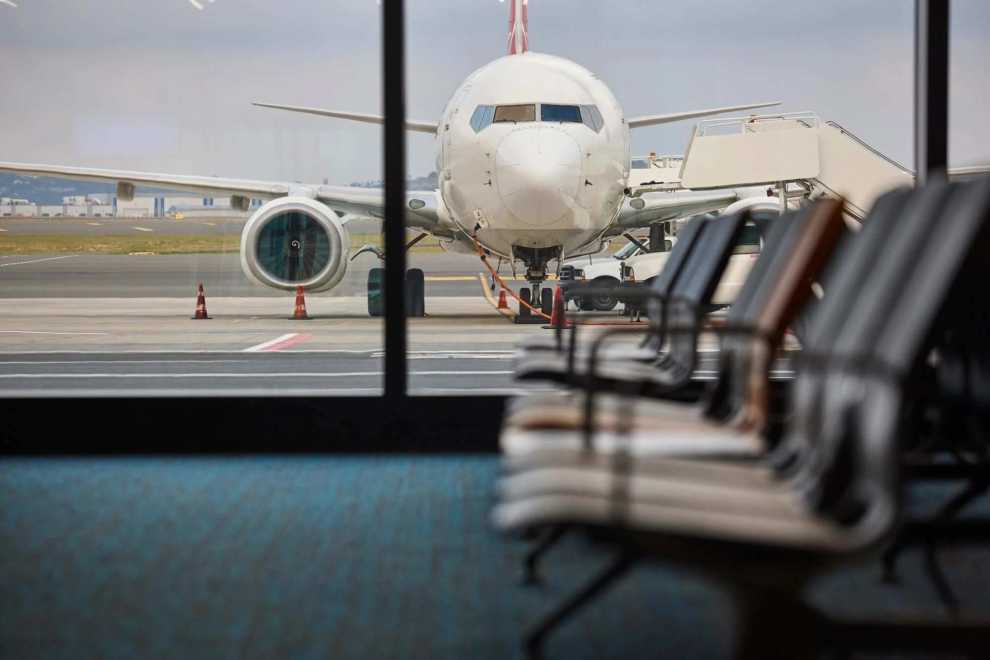 Airplane at an airport gate.