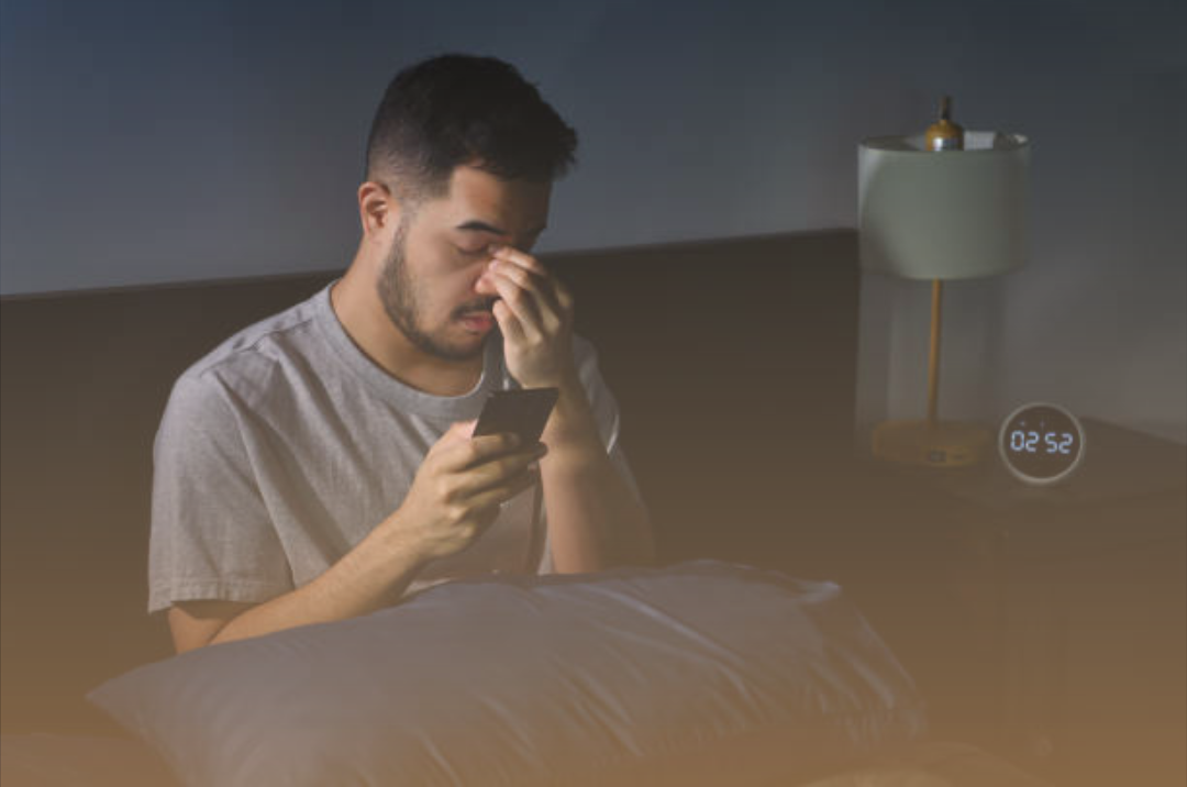Person being woken up in the middle of the night by phone call