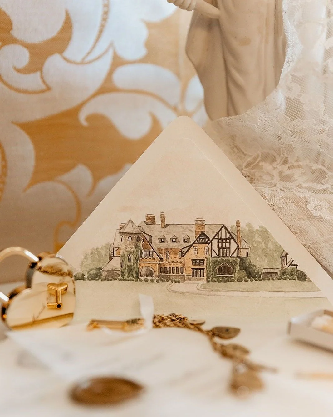 The story begins the moment the envelope opens. ✨ Inside, a hand-painted watercolor of Dover Hall sets the stage for a wedding filled with timeless romance and grandeur. 🕊 Every detail of this estate illustration whispers you&rsquo;re invited to som