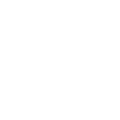 Outline of a large, ornate building with a central arched entrance and symmetrical tall towers on each side.