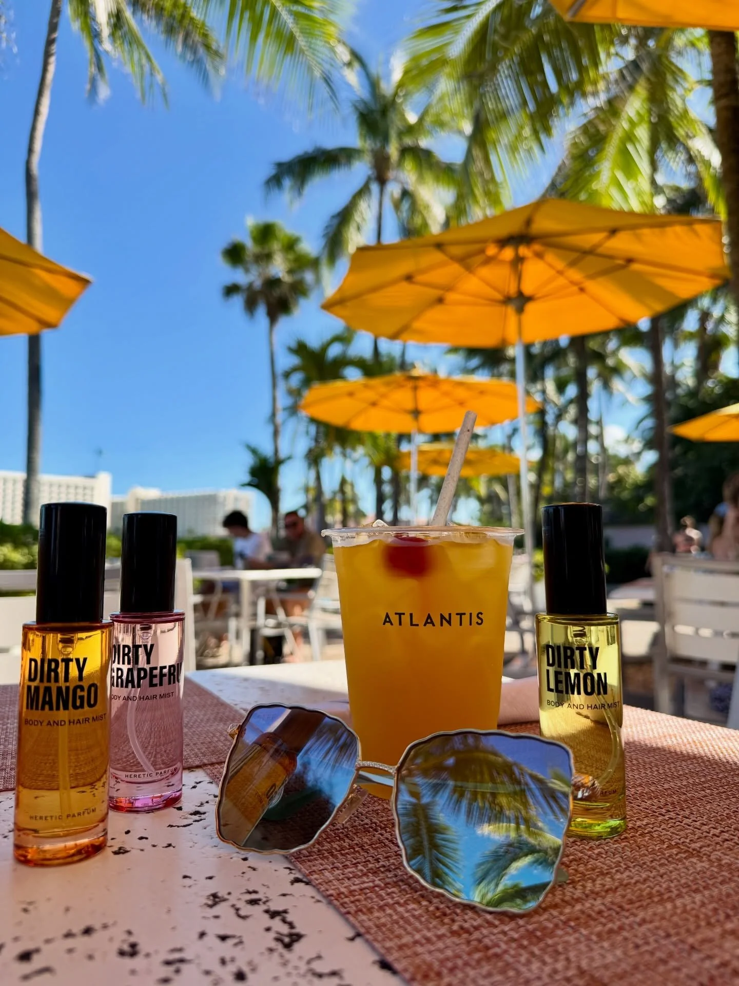 Dirty Mango 🍋 Dirty Grapefruit 🍊 Dirty Lemon by @hereticparfum a sun-kissed chaos in a bottle. Sweet, sharp, and a little wild, this citrus fragrance layering combo was what I wore that day at the lagoon, the perfect scent for a never-ending summer