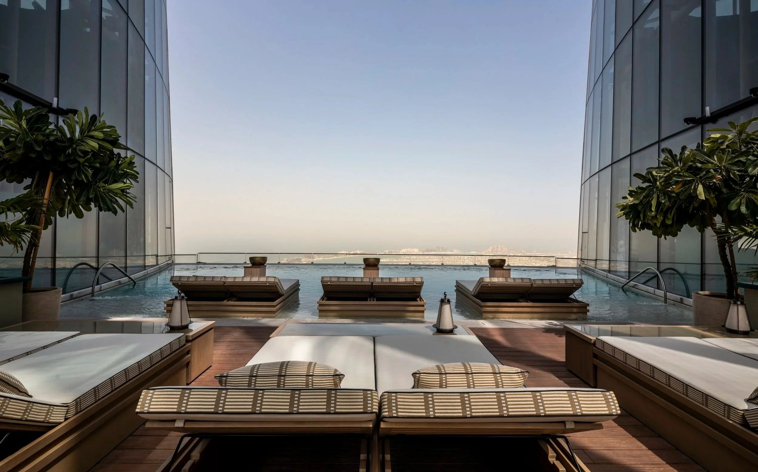The pool deck with views of the worlds highest infinity pool and views of the Palm beyond.