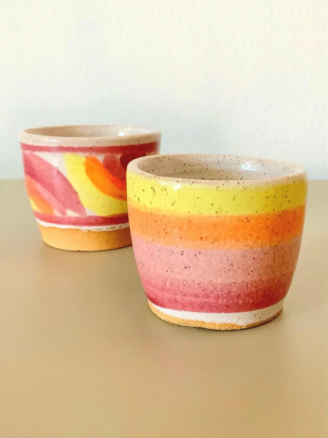 small handmade pottery cups