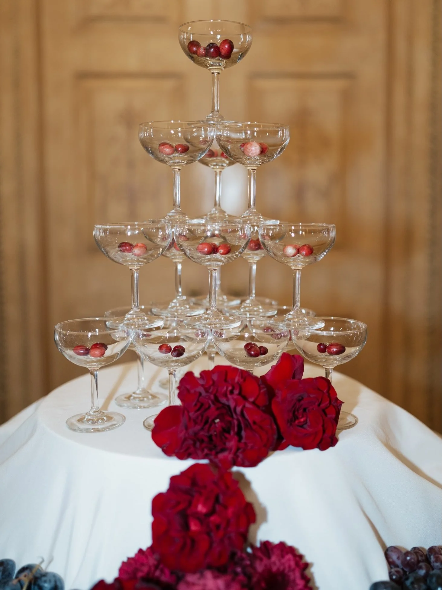 It was rich in the best way. Dark wood rooms, red florals spilling across the tables, textures and history everywhere.

The kind of wedding atmosphere that doesn&rsquo;t ask for attention, but holds it anyway. 

Host - @tiannasamonecreatives
Photogra