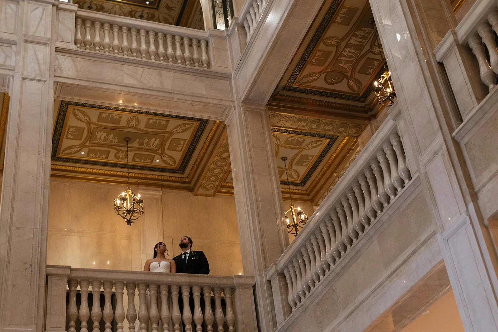 Bride and groom admiring the views of Book Tower from the second floor.