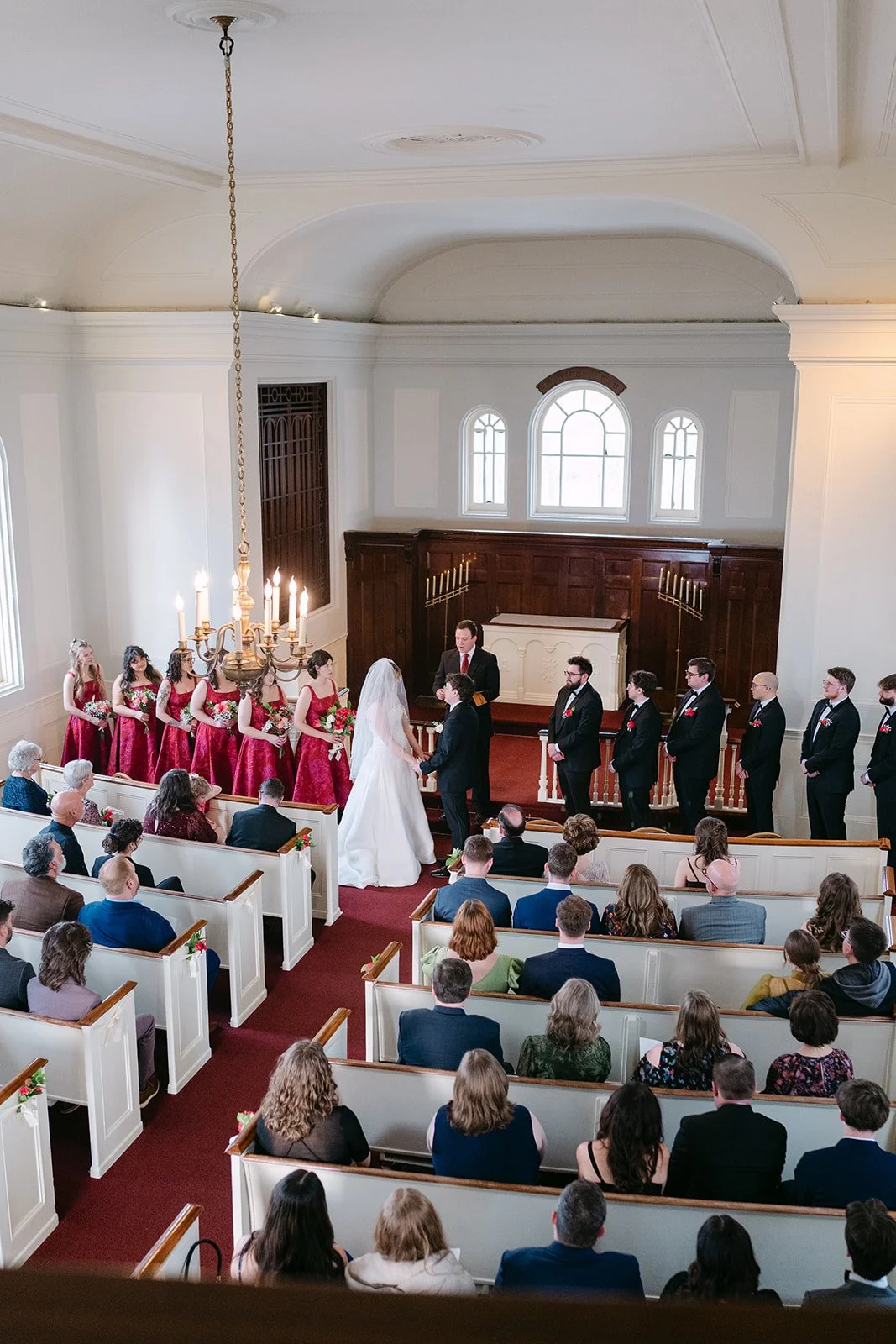 Overhead shot of a Greenfield Village wedding ceremony inside Martha-Mary Chapel.