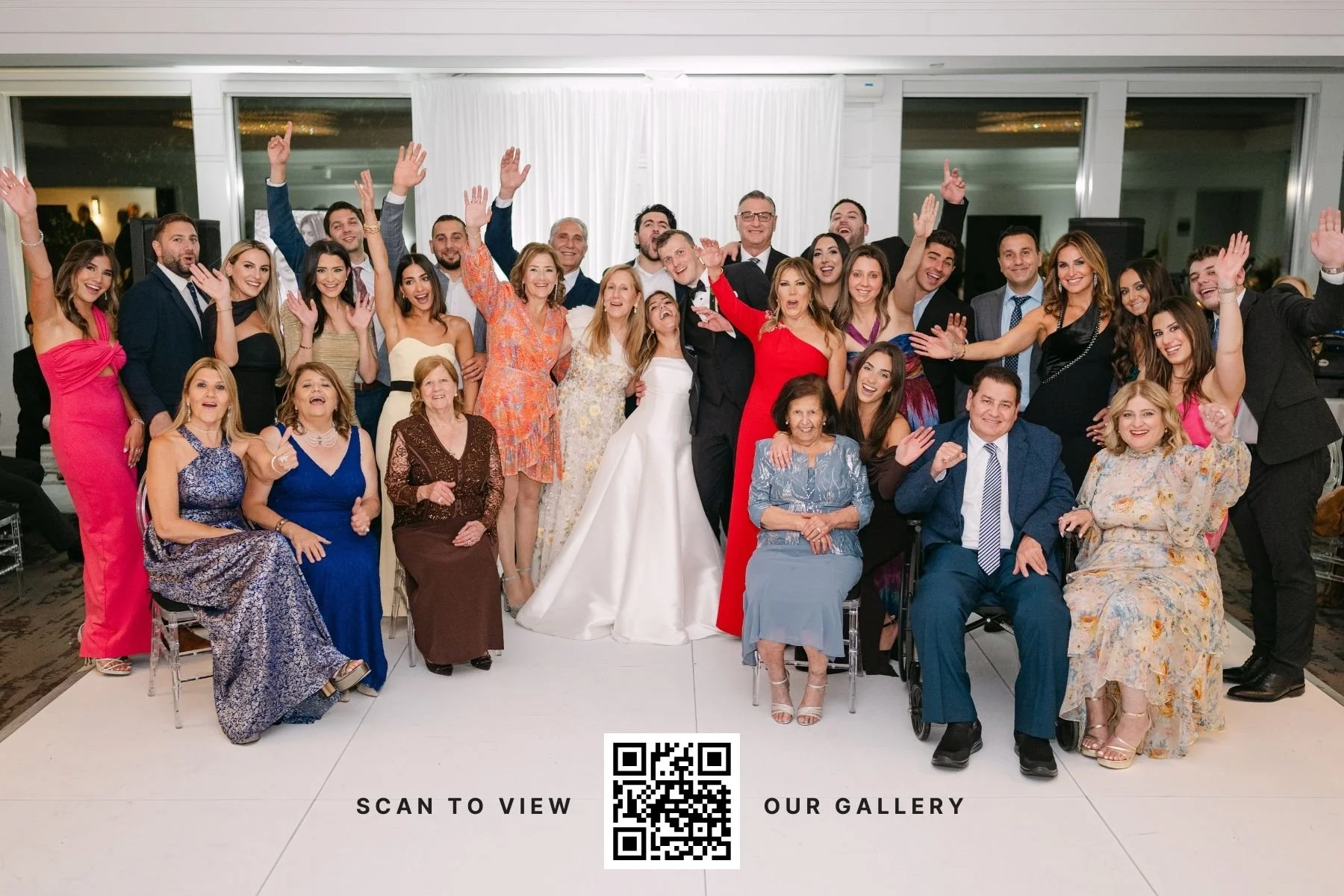 A large group photo captured at a wedding at the Wabeek Country Club.