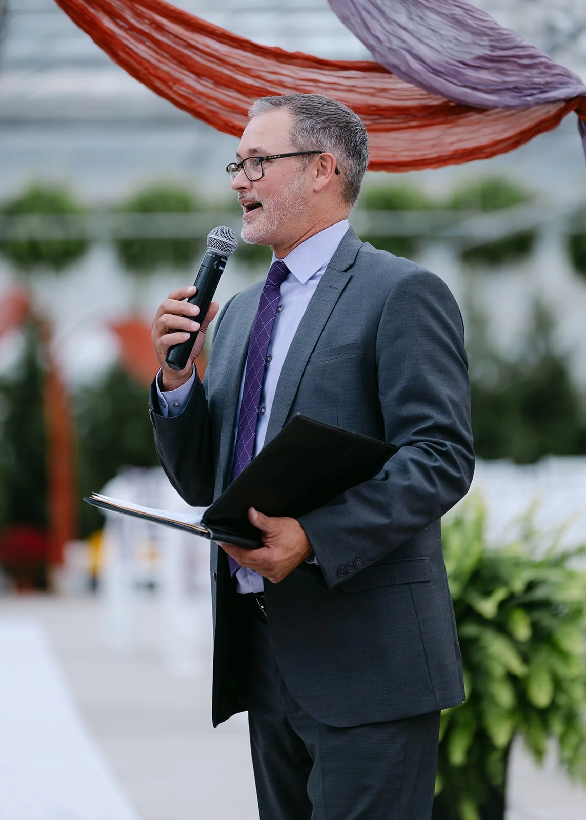Guest giving a speech during the reception.