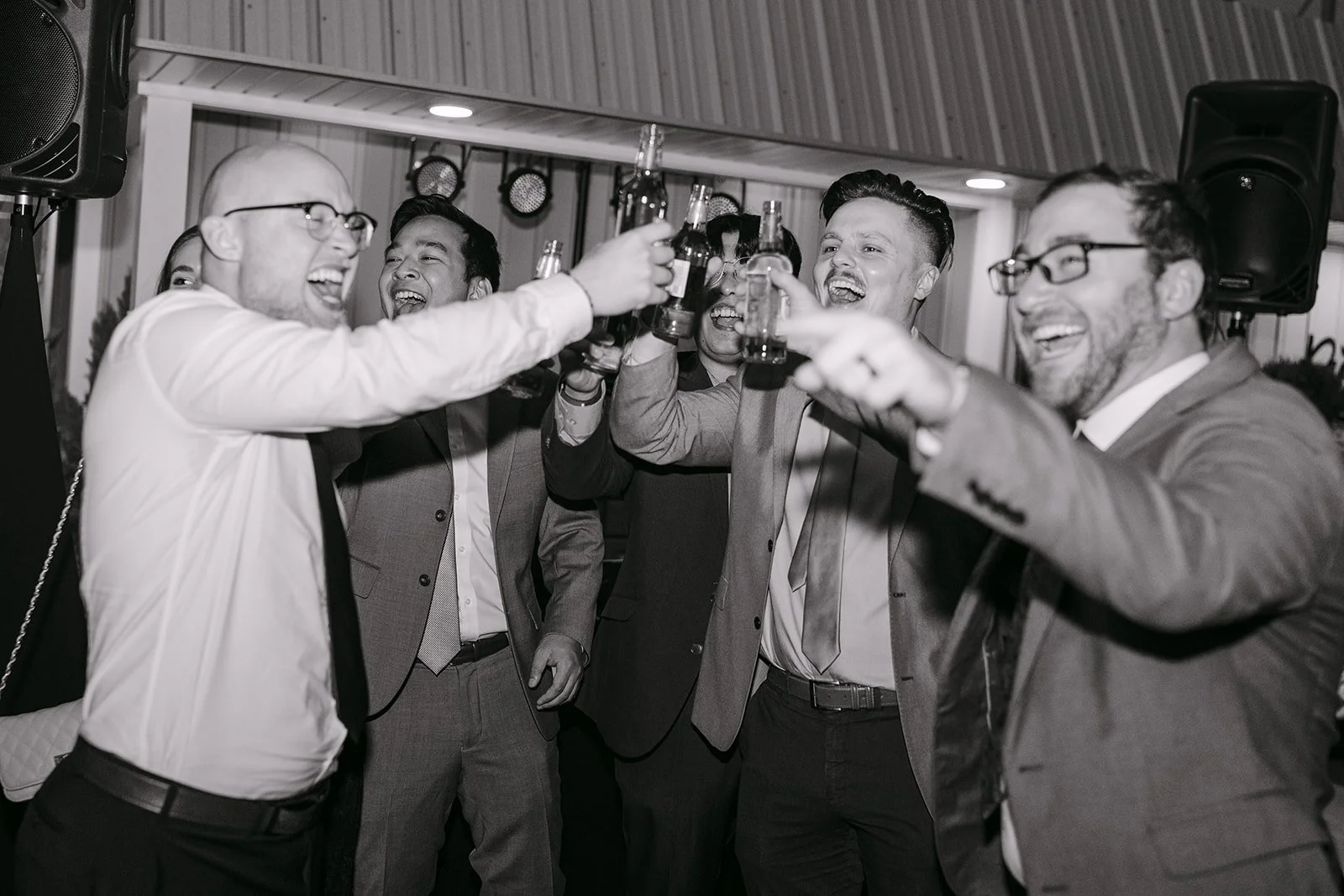 Groomsmen getting iced during a Saginaw wedding reception.