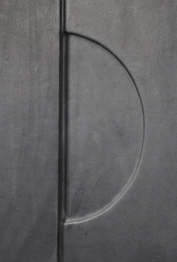 a bold pattern of a midcentury modern style shaped leather wall covering for luxury interiors by Marrikur Studios