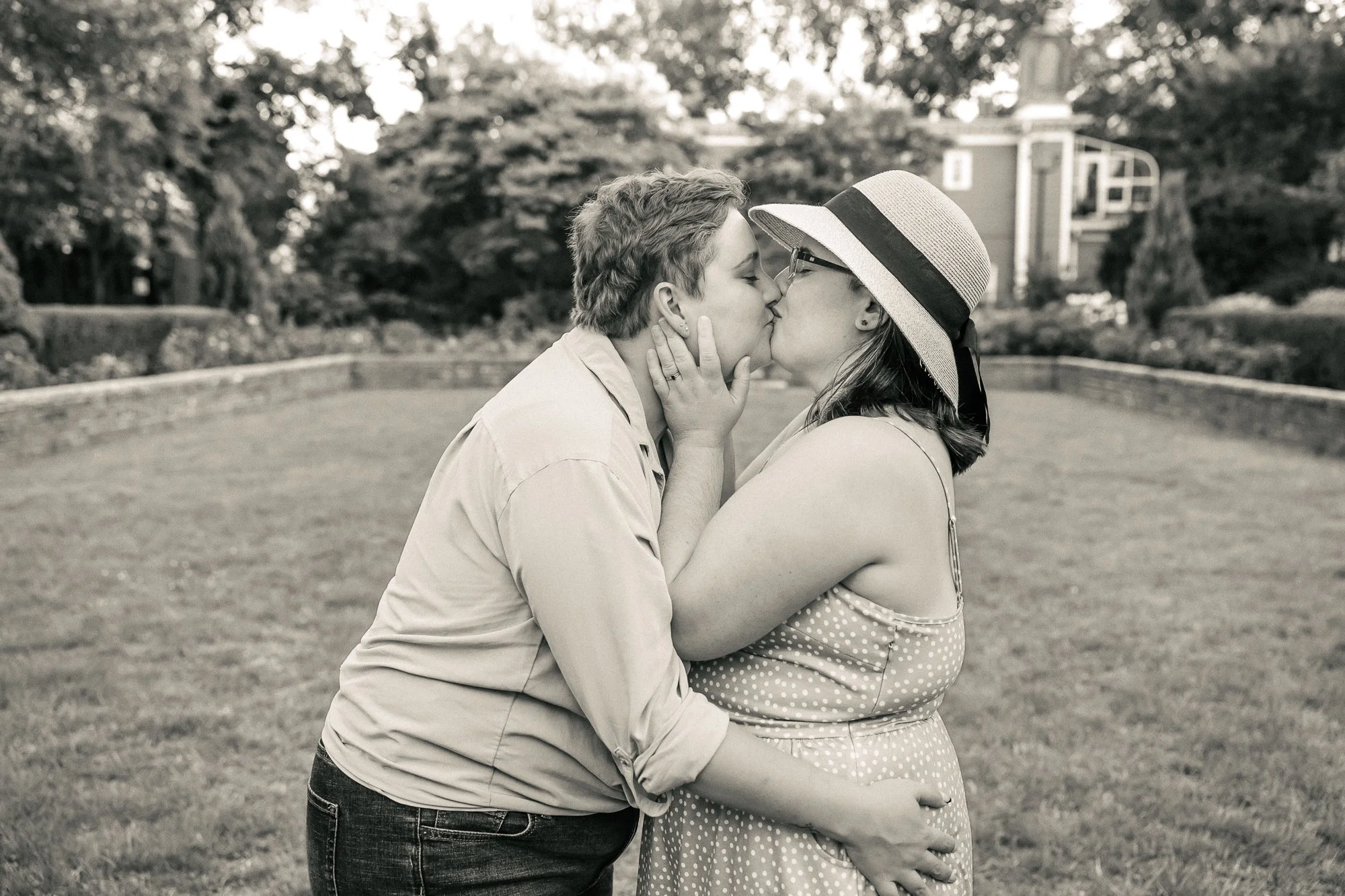 A queer couple shares a kiss during their Evanston engagement session