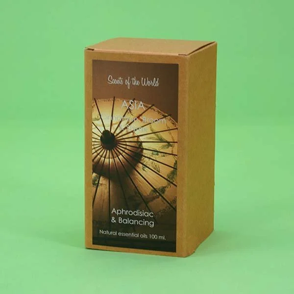 Kraft paper mailer box with printed label on the front for Scents of the World.