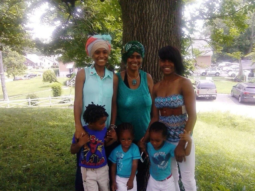 JAiy, Her Sister, Child.jpg