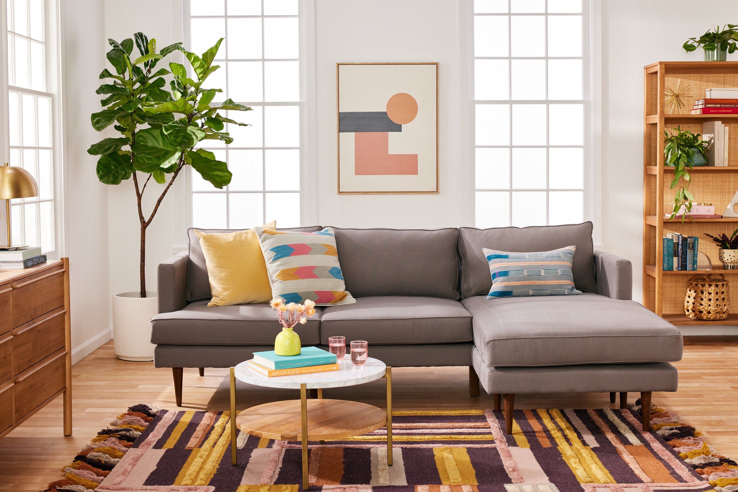 joybird grey sofa and colorful rug.jpg