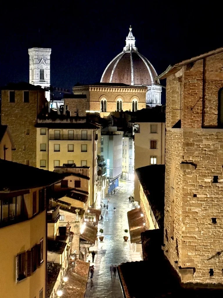 Evening view looking down Via Dei Servi with Brunelleschi's famous dome in Florence.  Giotto's Bell Tower is on the left.