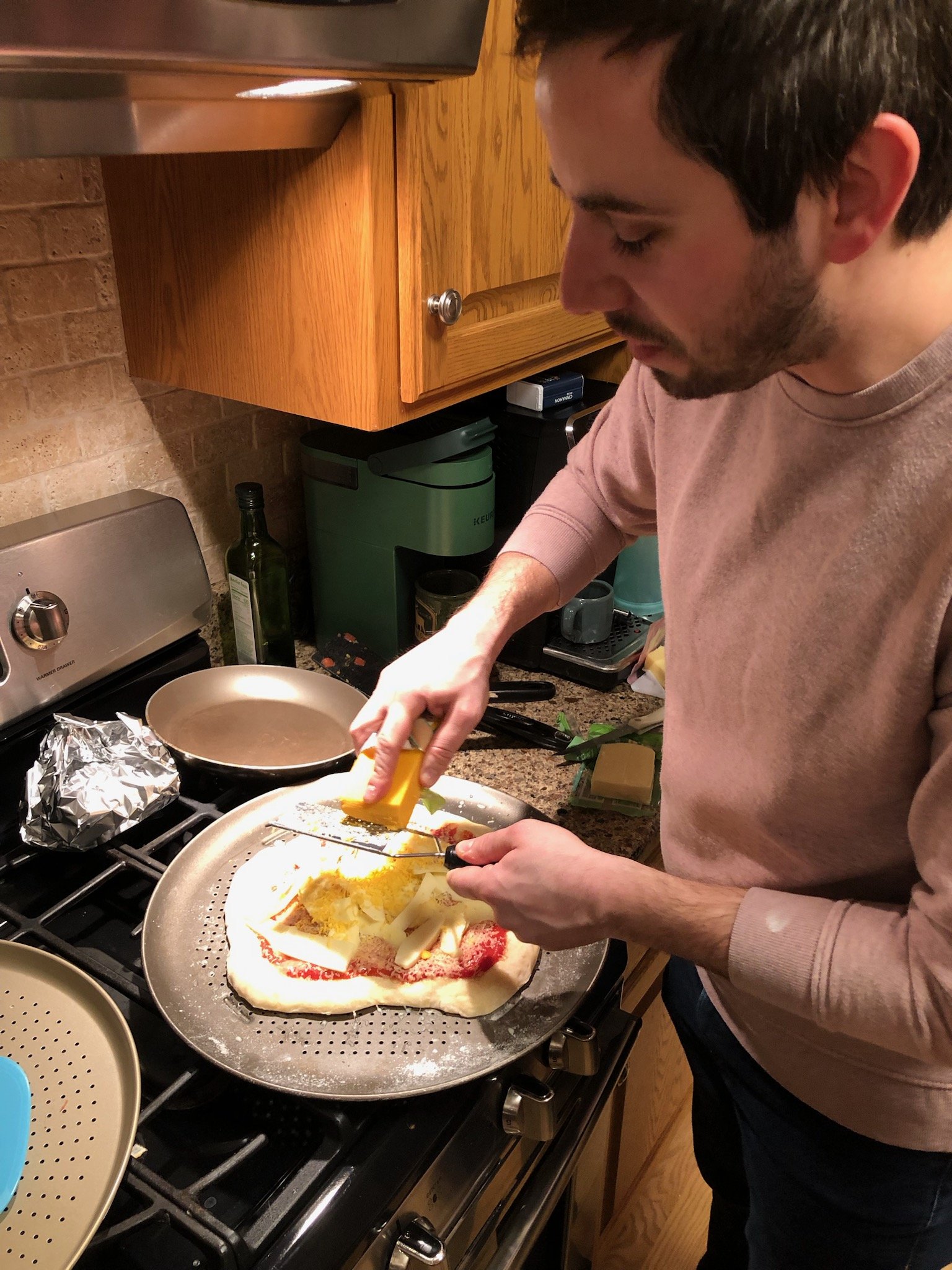 New Year's Party 2023 at Ken's house - Nikola making pizza