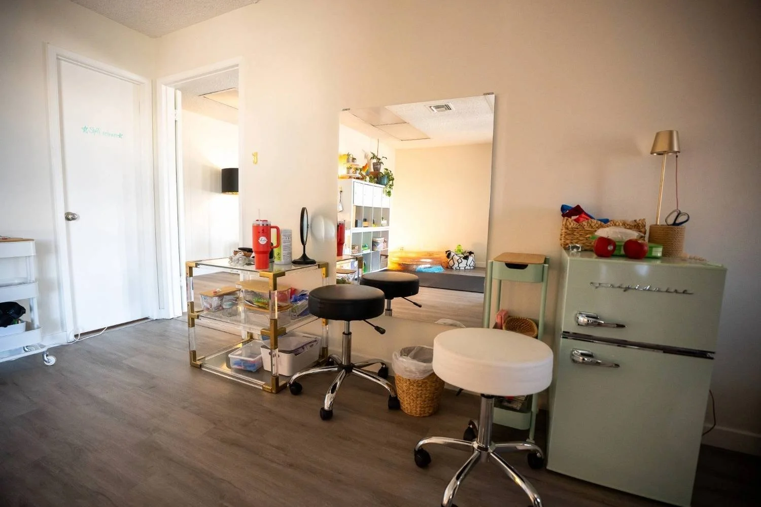 Spacious pediatric therapy room with sensory equipment and movement activities at Wetherbee Pediatric Therapy