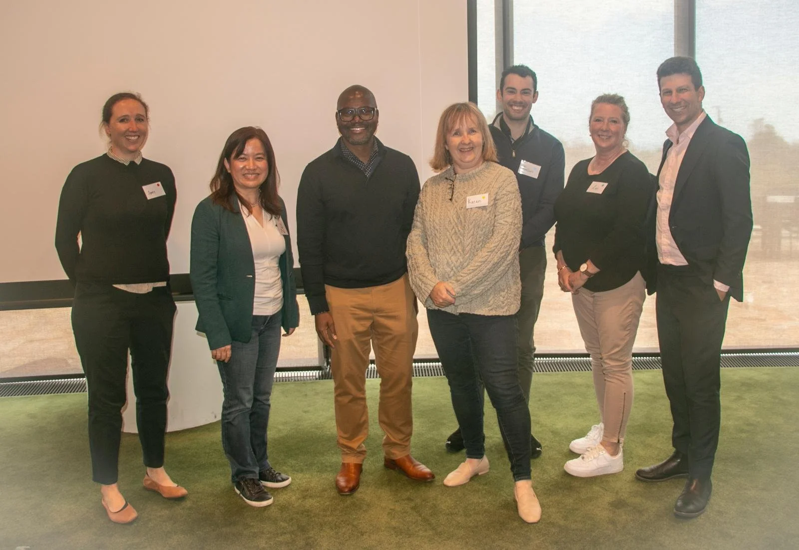Inaugural Monash Health Cancer Research Retreat with Josh MC'ing, accompanied by Director Zee Wang Wong and CEO Professor Eugine Yafele