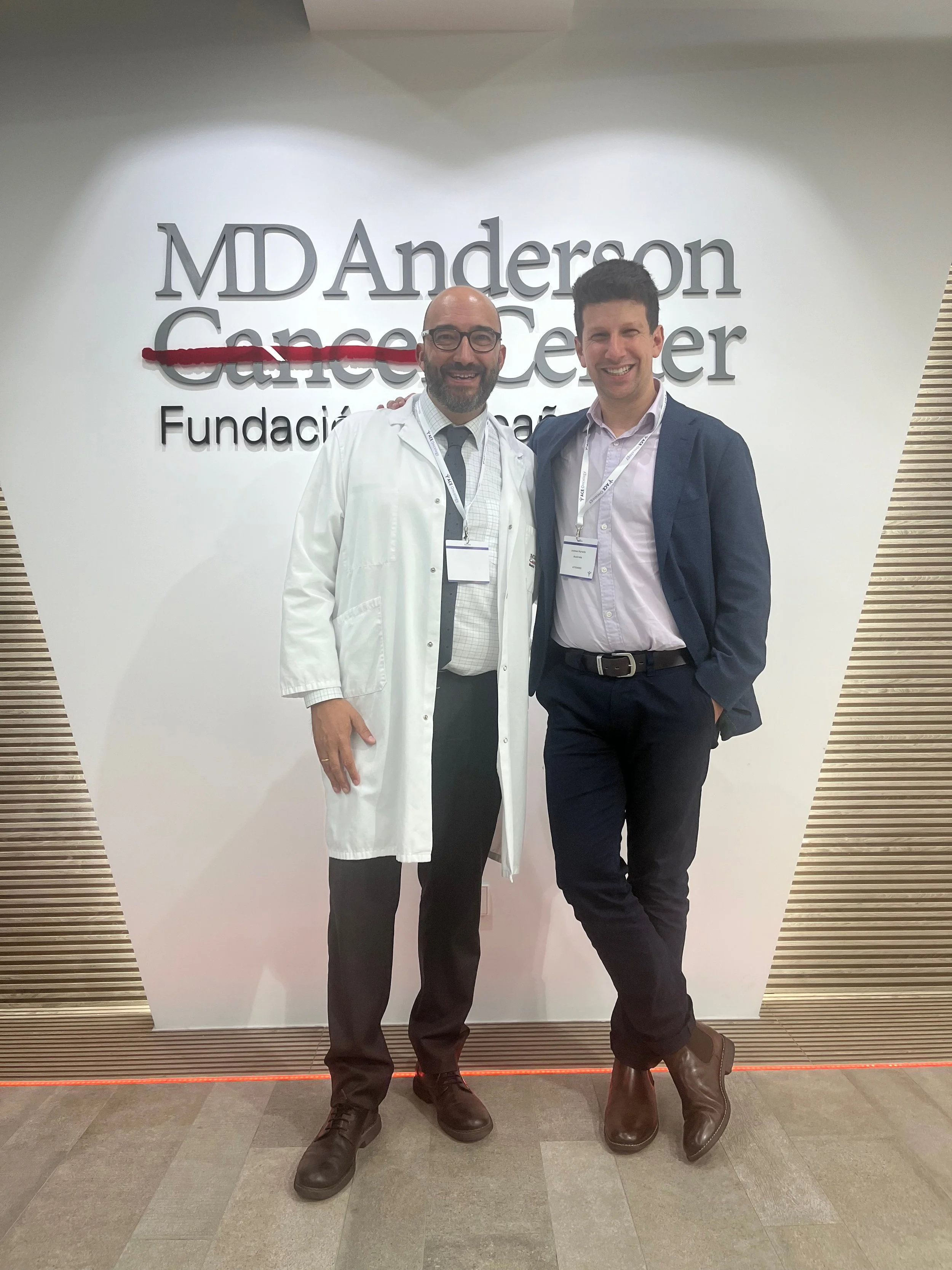 Josh and Dr. Enrique Grande hanging out at MD Anderson Cancer Centre Madrid