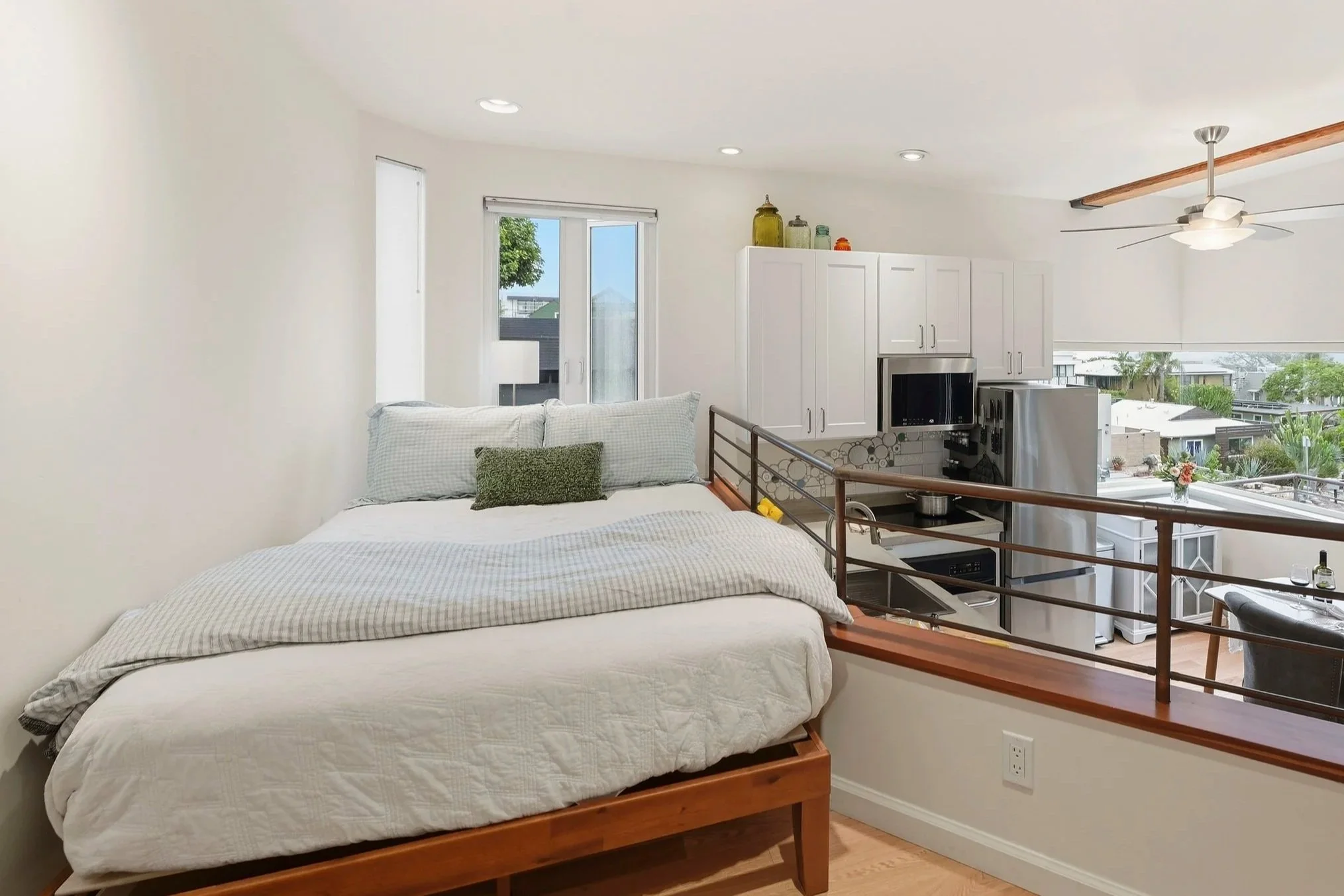 Photograph of an ADU studio unit. View of bedroom. Furnished rental unit ready for move in.