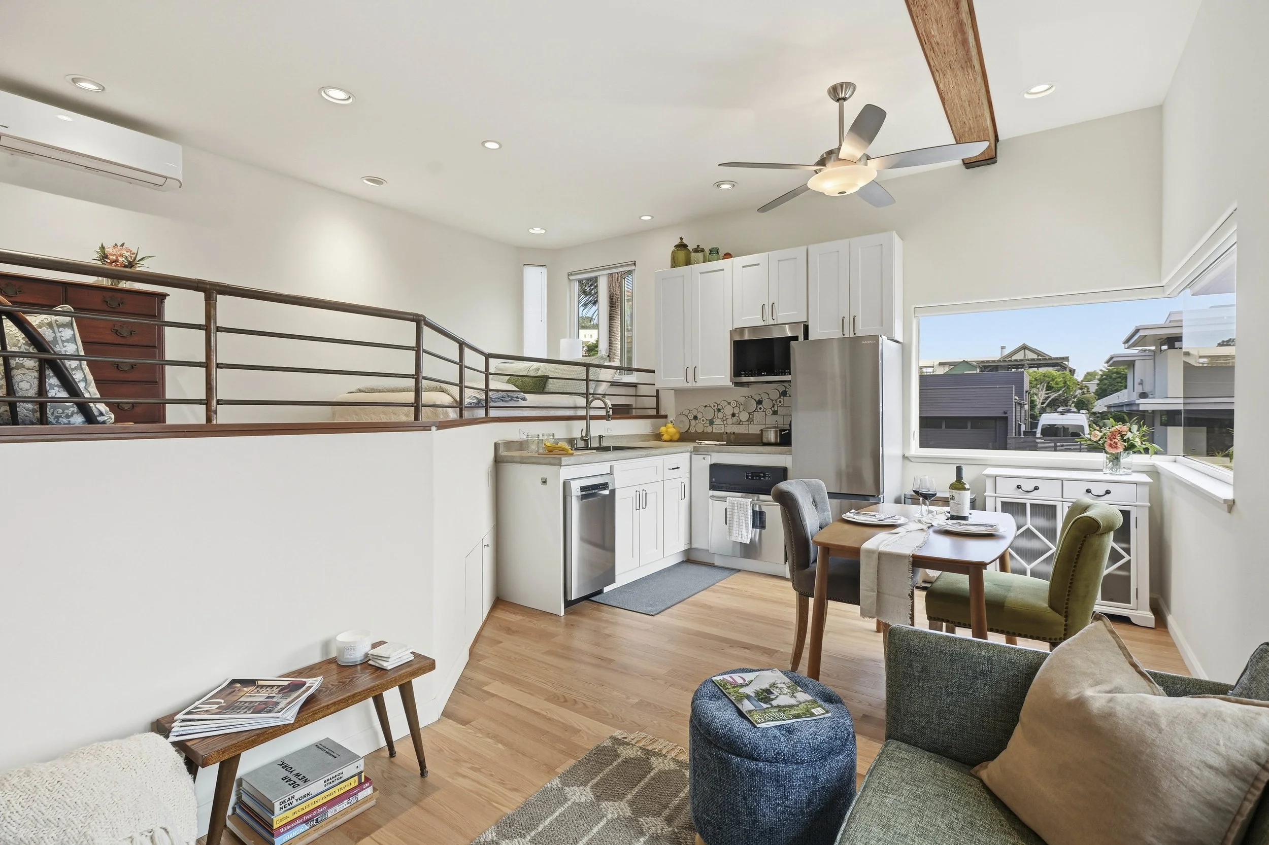 Photograph of an ADU studio unit. Coastal, bright, natural lighting, furnished unit ready for rent.