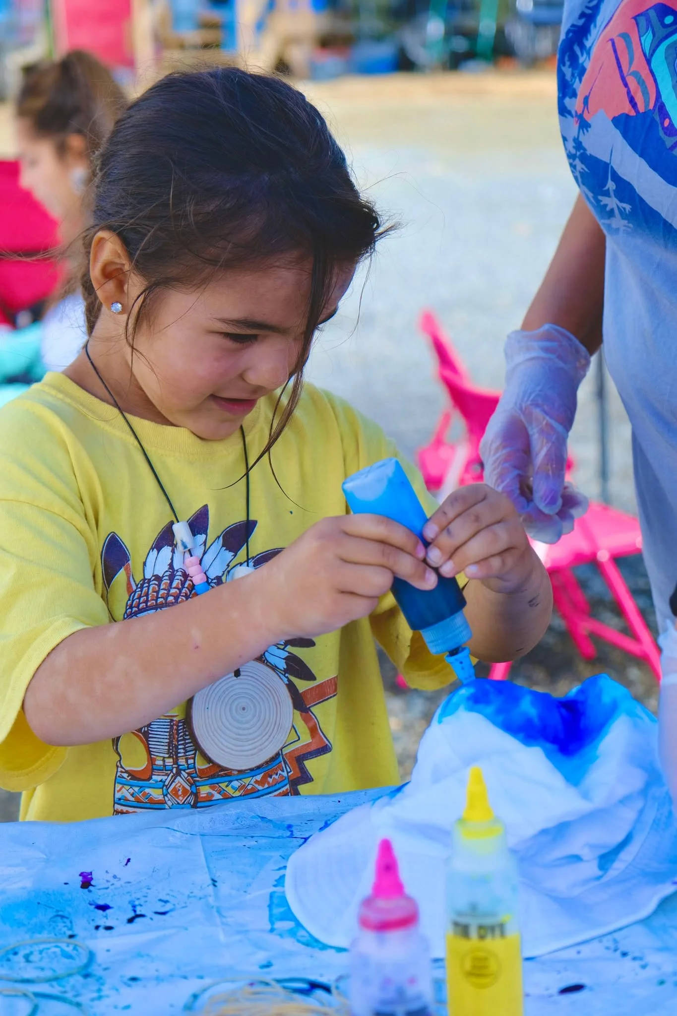 Girl making tye dye bucket hat.jpg