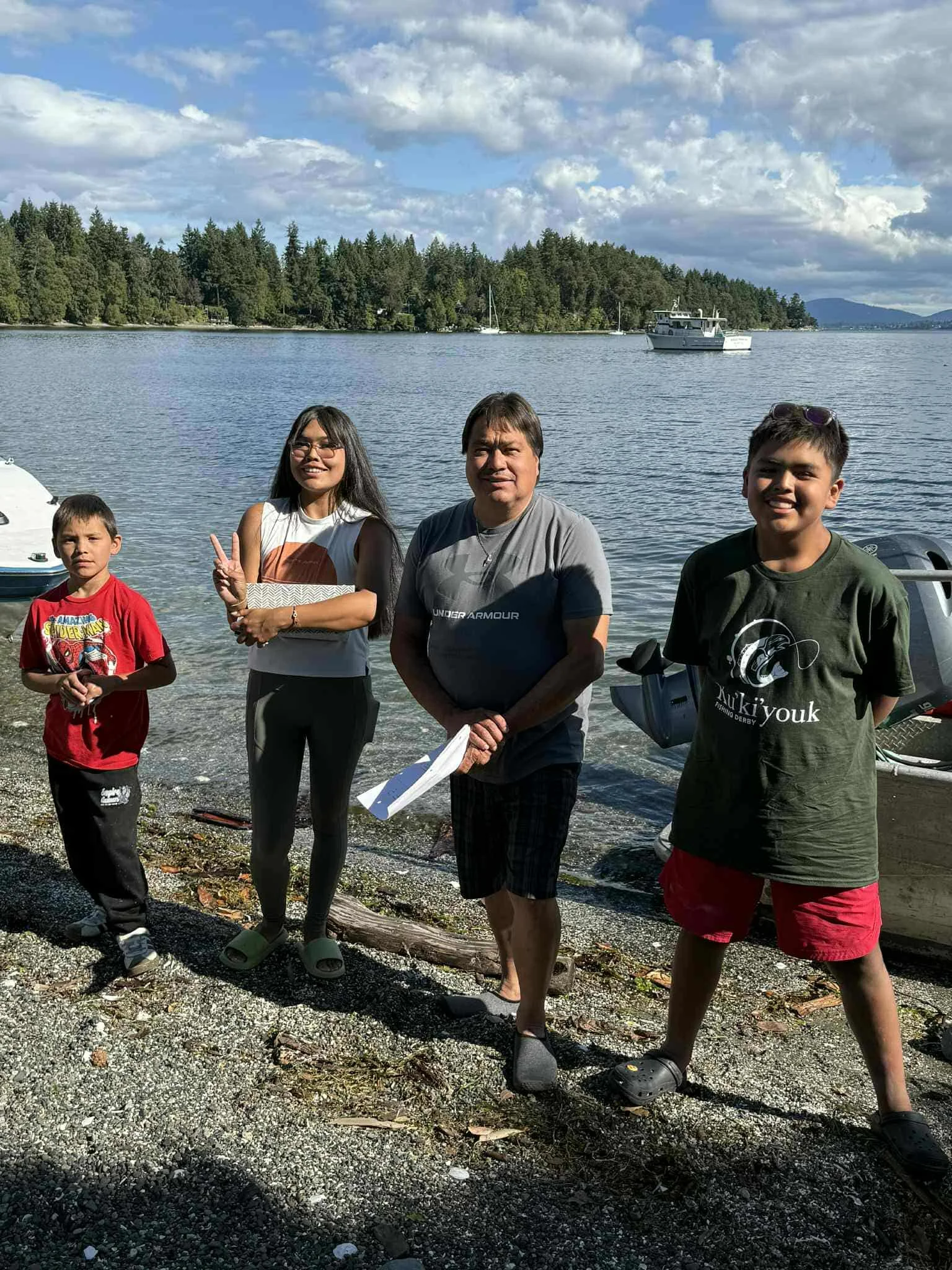 Jennifer and John with FIshing derby kiddos.jpg