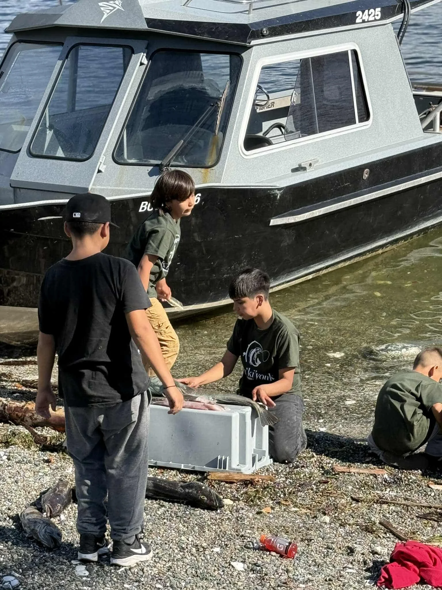 Kiddos prepping their catches.jpg