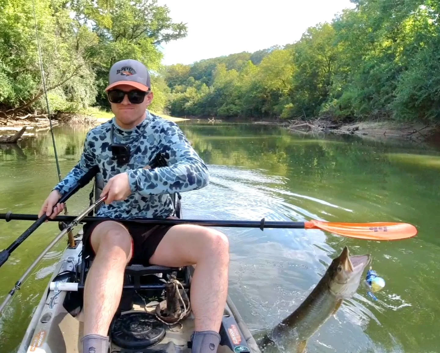 Some consecutive frames from today's video that I thought were cool. I was fighting it on the right side of my kayak, when it swam under the kayak and jumped up on the other side to do a flip. I even landed it (shocker- I know)!